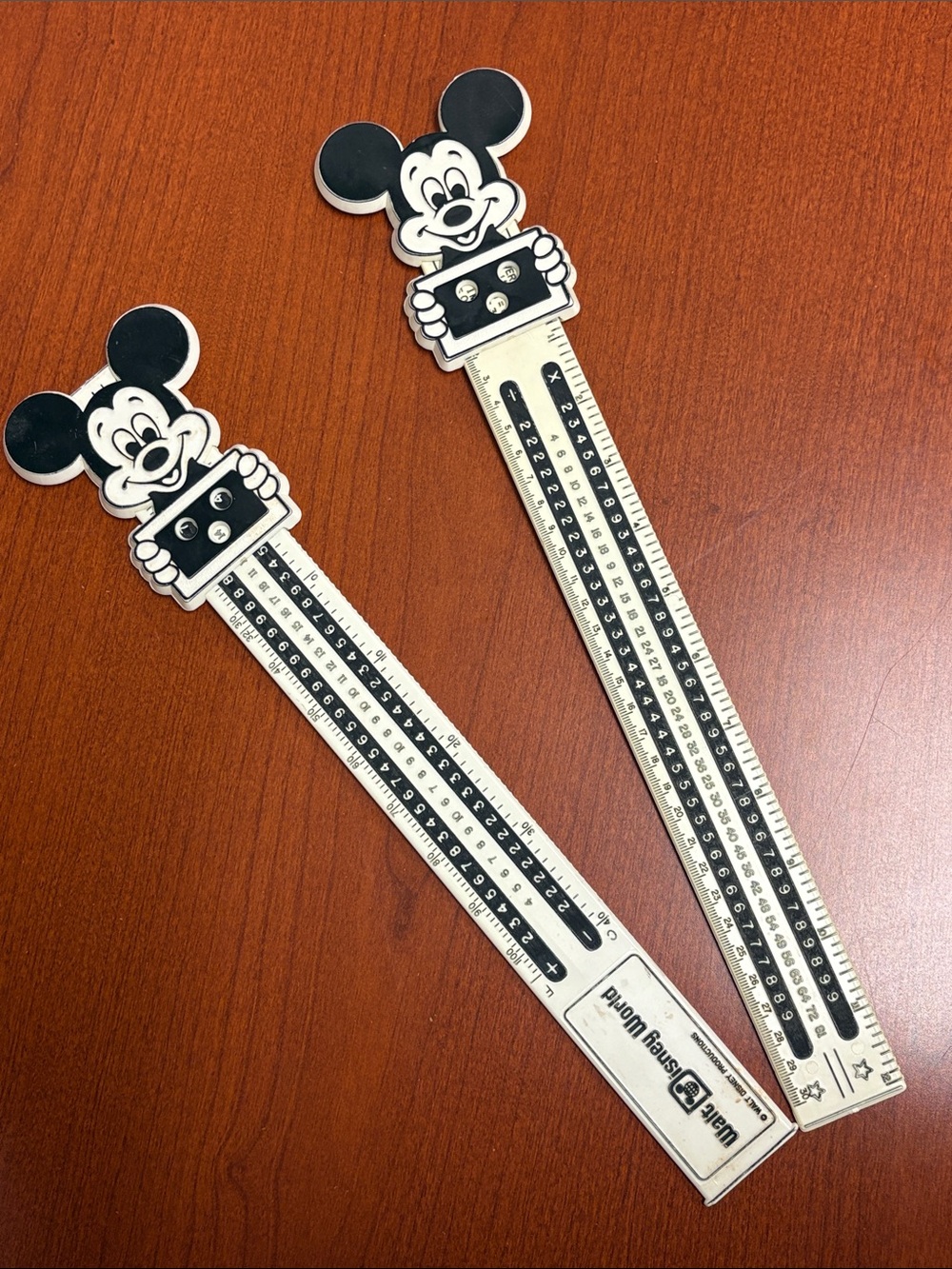 Vintage Mickey Mouse slide rulers